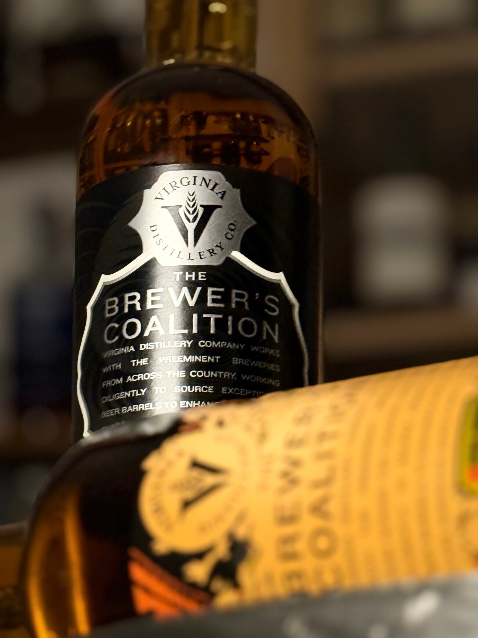 Virgina Distilling Co's "Black Tuesday" stout finished stands tall above blurred barleywine finish release